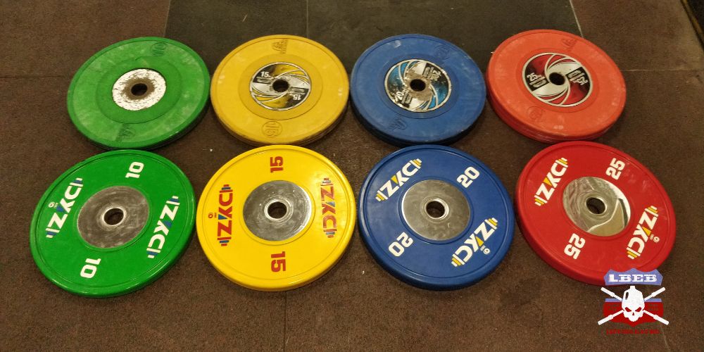 difference between bumper plates and olympic plates